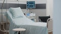 Nobody in hospital ward bed with medical equipment