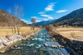 Noce River surrounded by snow-capped mountains Italian Alps Dolomities Royalty Free Stock Photo