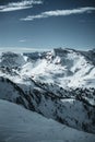 Nocky mountains in austrian Alps photographed from a slope in February. Royalty Free Stock Photo