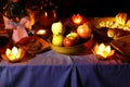 Nocturnal wedding feast held in nature with enchanting lotus shape cande holders. Royalty Free Stock Photo