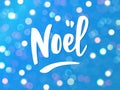 Noel hand drawn letters. Holiday greetings quote. Blue sparkling glowing lights background.