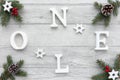 Noel written on Christmas Background with Christmas Decoration Royalty Free Stock Photo