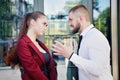 Noisy quarrel with the head of the office employee. A man screams at a woman.