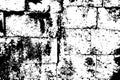 Noisy weathered stone brick wall texture. Black and white stone bricks. Obsolete stone wall.