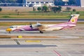 NokAir De Havilland Canada Dash 8 Q400 airplane at Bangkok Don Mueang Airport in Thailand