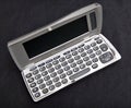 Nokia Communicator 9210 displaying keyboard and screen on black background Royalty Free Stock Photo