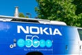 Nokia 5G wireless network architecture capabilities sign on the vehicle with telescopic 5G antenna