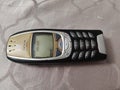 Nokia old Mobile Phone in black and gold colors, Nokia`s most popular phone launched in the 2000`s