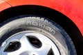 The Nokian rubber tyre mounted on a red car