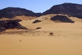 Nomad crossing a vast desert landscape