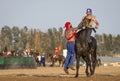 Nomad men wrestling on horseback Royalty Free Stock Photo