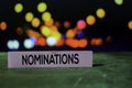 Nominations on the sticky notes with bokeh background