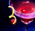 Non alcoholic drink cherry in cocktail glass on black background. Royalty Free Stock Photo