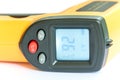 Non contact digital thermometer infra red yellow Royalty Free Stock Photo