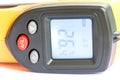 Non contact digital thermometer infra red yellow Royalty Free Stock Photo