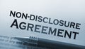 Non disclosure agreement document with pen close-up Royalty Free Stock Photo