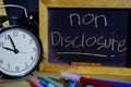 Non disclosure management on phrase colorful handwritten on blackboard. Royalty Free Stock Photo