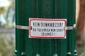 Non drinkable water sign plate in German and Turkish languages on an ancient water fountain in Nikolaiviertel, Berlin, Germany Royalty Free Stock Photo