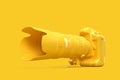 Non-existent Yellow DSLR camera on yellow background. 3D illustration Royalty Free Stock Photo