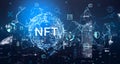 Non-fungible token hologram on virtual screen, nft with network circuit and globe. Downtown cityscape on background. Concept of