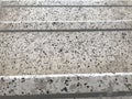 Non slip grooves made over the Treads of Staircase finished by Granite stone flooring and for steps of an high rise building fire