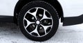 Non-studded snow tires on the car at winter road Royalty Free Stock Photo