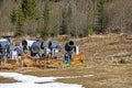 non-working snow generator on a slope without snow gear at a resort on a sunny day. Active recreation Royalty Free Stock Photo