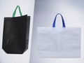 Non woven bags, eco bags, Friendly bags, black color bag, white color bag Royalty Free Stock Photo