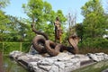 Nong Khai Thailand 12 April 2021 The bronze statue of a serpent and a nakhi in gold. Buddhist beliefs stand outdoors.