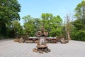 Nong Khai Thailand 12 April 2021 The bronze statue of a serpent and a nakhi in gold. Buddhist beliefs stand outdoors.