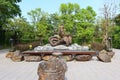 Nong Khai Thailand 12 April 2021 The bronze statue of a serpent and a nakhi in gold. Buddhist beliefs stand outdoors. Royalty Free Stock Photo