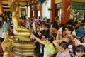 People pray in Wat Pho Chai buddhist temple in Nong Khai, Thailand.