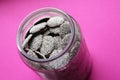 Nonpareils candies in a glass jar