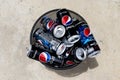 Top view many Pepsi can in trash