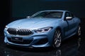 Nonthaburi , Thailand - Dec 6, 2018: BMW the 8 Series Coupe blue color in motor expo , black background Royalty Free Stock Photo