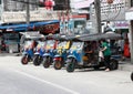Tuk tuks are stop in the line waiting for passengers at the roadside
