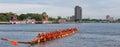 Oarsmen on a traditional long wooden boat