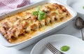 Noodle casserole with cannelloni noodles, bolognese sauce, bechamel sauce and mozzarella cheese topping