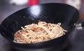 Noodle with chicken in a wok pan Royalty Free Stock Photo
