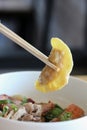 Noodle duck dumplings on table