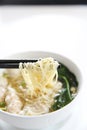 Noodle and wonton soup on a bowl Royalty Free Stock Photo
