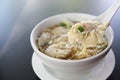 Noodle and wonton soup on a bowl Royalty Free Stock Photo