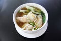 Noodle and wonton soup on a bowl Royalty Free Stock Photo