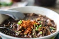 The noodle with pig blood soup mix with pork and vegetable Royalty Free Stock Photo