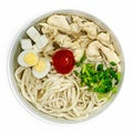 Noodle soup, chicken, egg and green onion in a plate on a white background Royalty Free Stock Photo