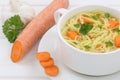 Noodle soup in cup with fresh noodles closeup
