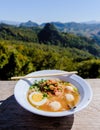 Noodle soup in the mountains of Northern Thailand Ban Jabo noodle restaurant famous viewpoint