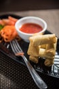 Noodle spring rolls with vegetable on black plate Royalty Free Stock Photo