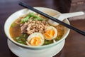 Noodle Tom Yam, hot spicy soup served with boiled egg. Royalty Free Stock Photo