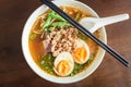 Noodle Tom Yam, hot spicy soup served with boiled egg. Royalty Free Stock Photo